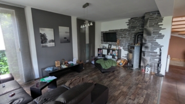 Wohnzimmer mit Kamin